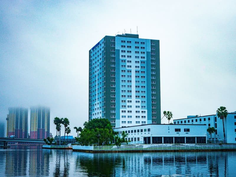 High-rise building beside a river