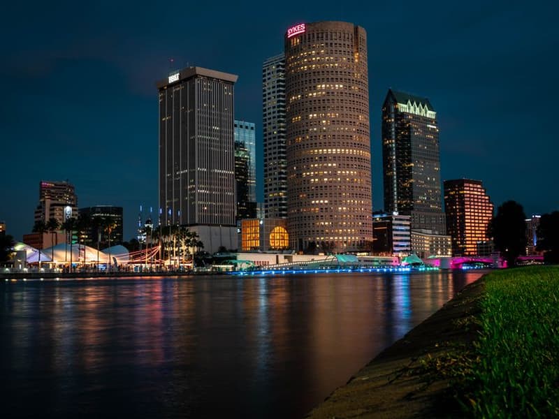 Tampa skyline reflected in the river at night
